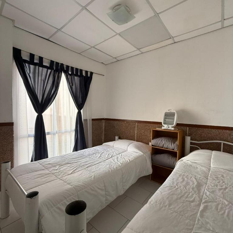 Casa YRIGOYEN - Two-Bedroom House - 18
