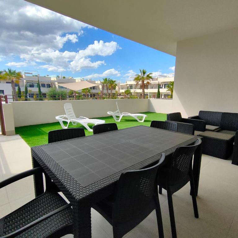 Mediterranean Gardens - Two-Bedroom Apartment with Pool View - 1