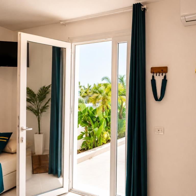 Monolocale elegante con design moderno e atmosfera tropical chic - One-Bedroom House - 3