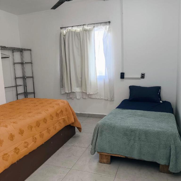 oriente con cama doble a 15 min de estadio - One-Bedroom Apartment - 5