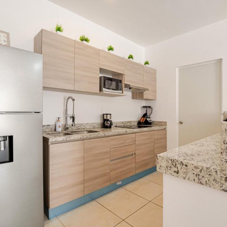 Resort Vibes King bed pool balcony 10 min to Beach - Two-Bedroom Apartment with Balcony - 8