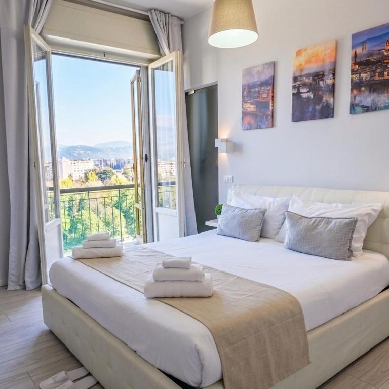 B&B Apartaments Novoli Guidoni 10 min to Center Airport Tram T2 Airport AC WIFI no ZTL - One-Bedroom Apartment - 8