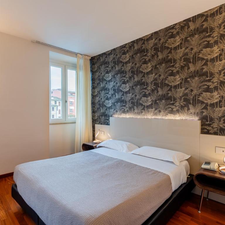 Hotel Vittorio - Camera Matrimoniale/Doppia con Letti Singoli con Vista Lago Parziale - 5