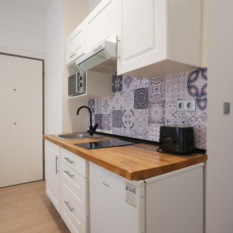 Tu Oasis Urbano con Jardín y Relax - Apartment - 11