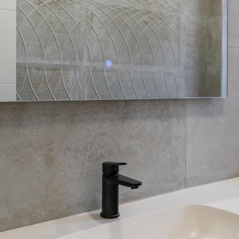 Tu Oasis Urbano con Jardín y Relax - Apartment - 21