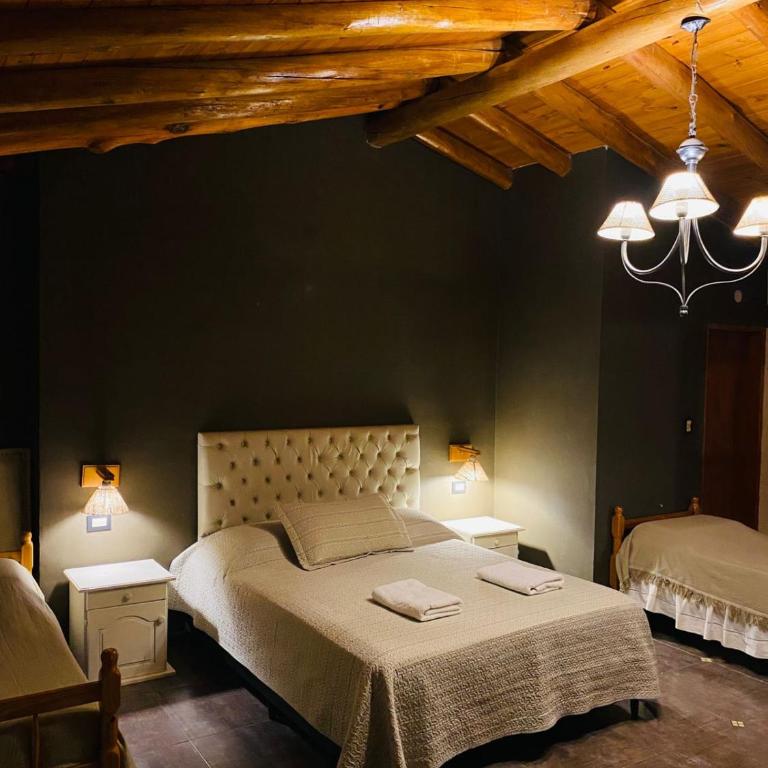 Posada La Ernestina Villa de las rosas - Quadruple Room with Garden View - 11