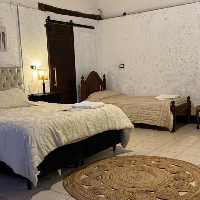 Posada La Ernestina Villa de las rosas - Quadruple Room with Garden View - 14