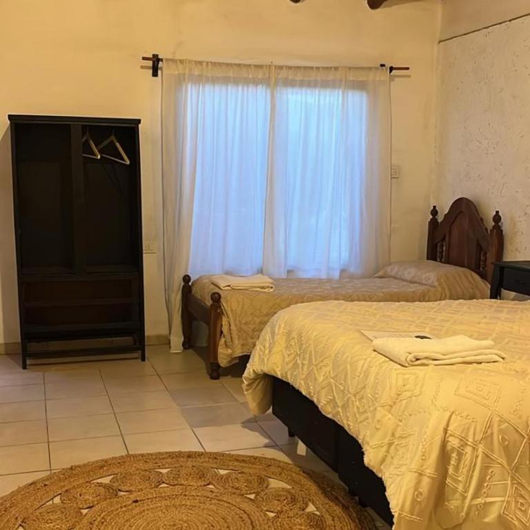 Posada La Ernestina Villa de las rosas - Quadruple Room with Garden View - 19