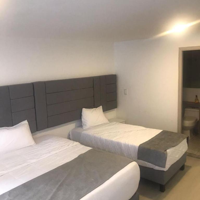 Hotel Downtown WD-conexión Corferias, Embajada EEUU y G12 - Comfort Triple Room - 5