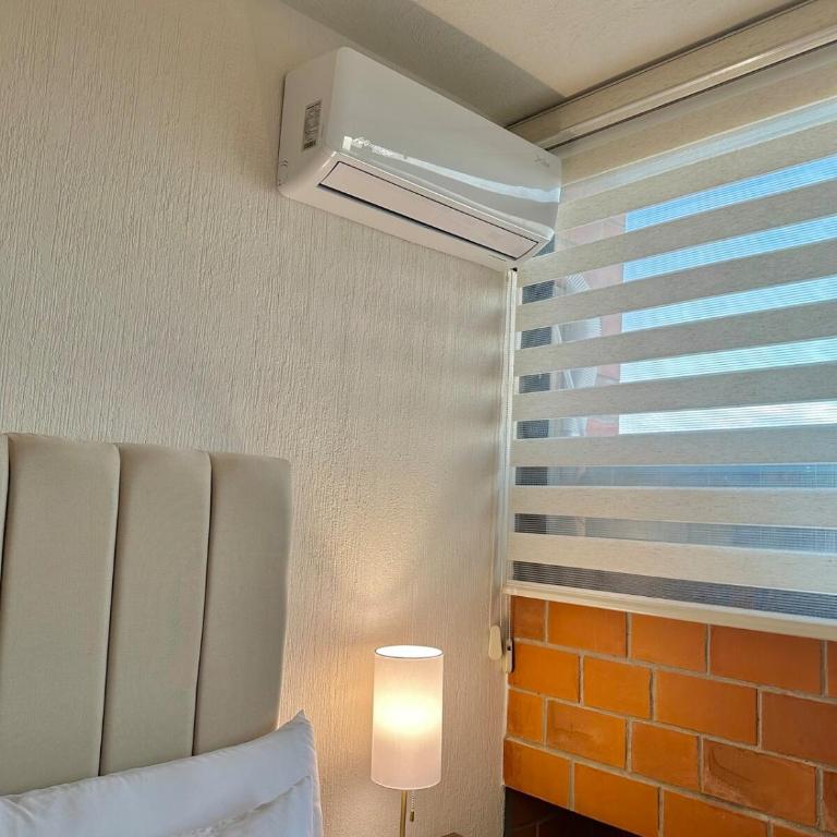 Departamento, Vista panorámica, Estacionamiento techado - Three-Bedroom Apartment - 33