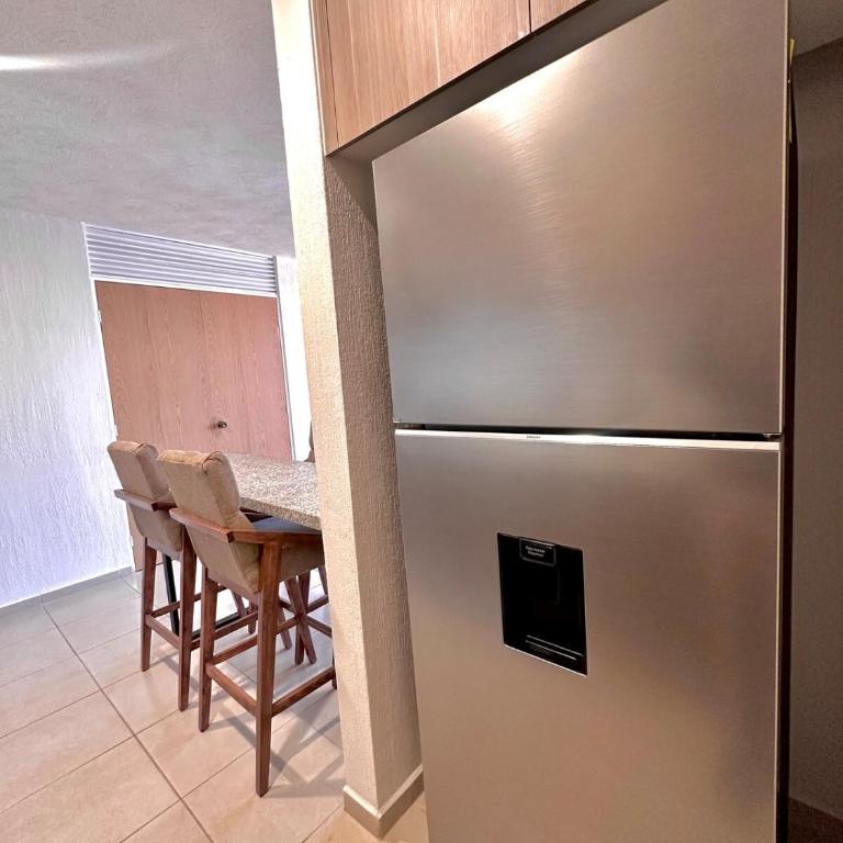 Departamento, Vista panorámica, Estacionamiento techado - Three-Bedroom Apartment - 37