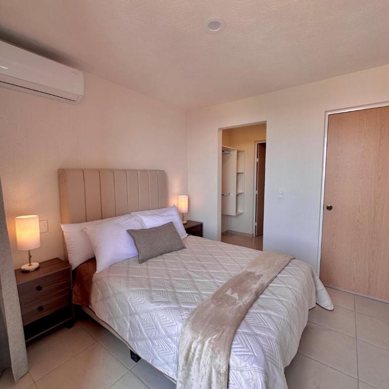 Departamento, Vista panorámica, Estacionamiento techado - Three-Bedroom Apartment - 43