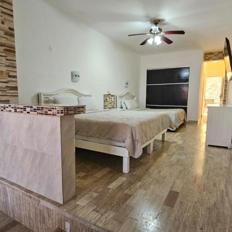 Caribbean View at Cancun Plaza Beachfront Condos - Suite Doble Deluxe - Cama grande - 34