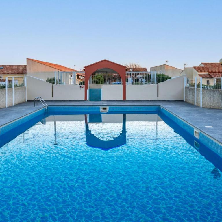 HOLIDAYLAND Résidence piscine les maisons de la plage appartement 213 climatisé rez de jardin - Appartement - Rez-de-Chaussée - 17
