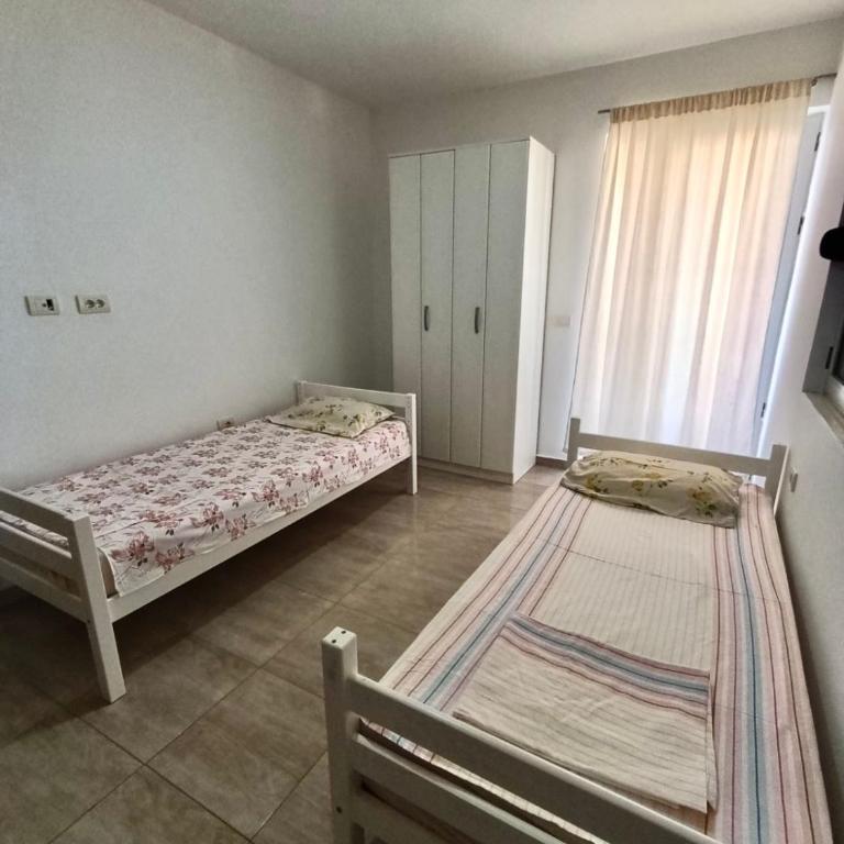 Green Retreat - Two-Bedroom Apartment with Balcony - 16