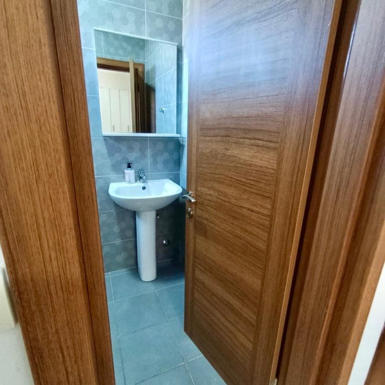 Green Retreat - Two-Bedroom Apartment with Balcony - 18