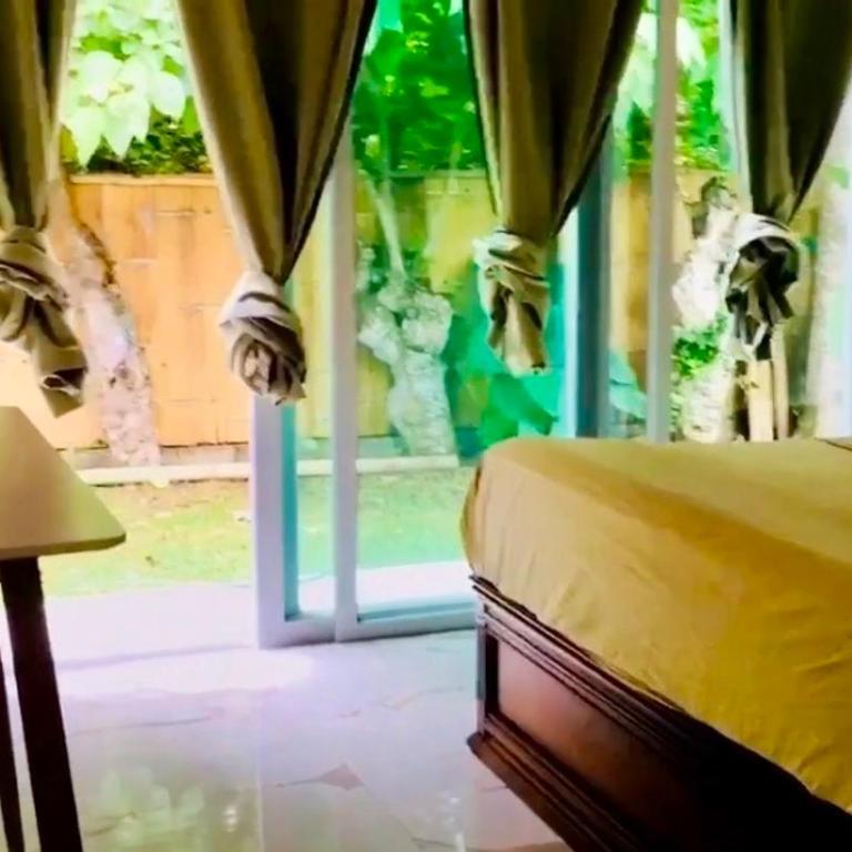 Hermosa casa rodeada de árboles y cerca a la playa - Two-Bedroom Villa - 11