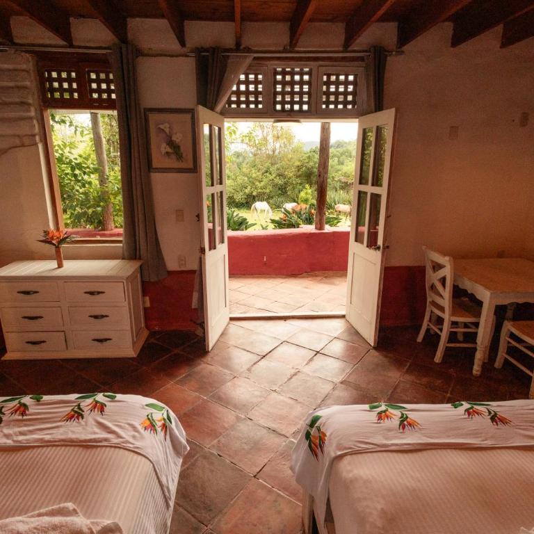 Rancho en Valle de Bravo - Habitación Doble con vistas al jardín - 14