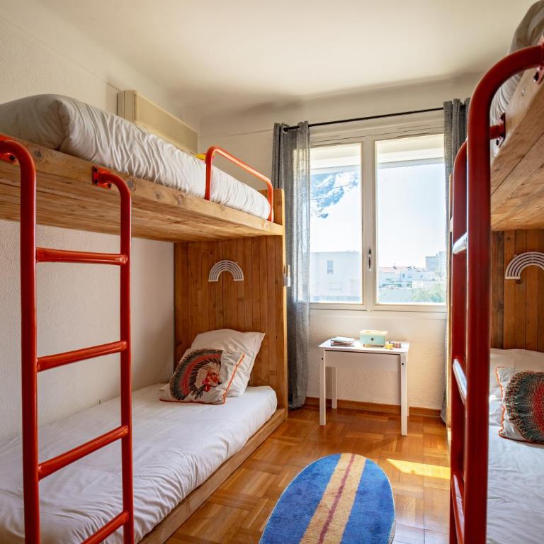 VILLA LES SALINES Maison de Vacances au Grau du Roi - Three-Bedroom Apartment with Balcony - 24