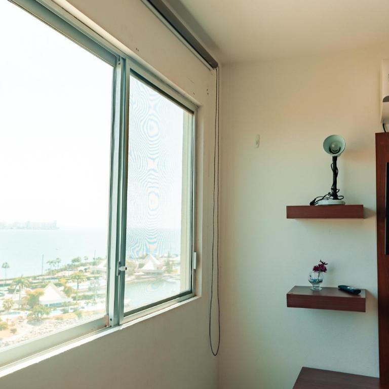 Departamento con vista al mar, piscina, jacuzzi y área BBQ - Apartment - 33