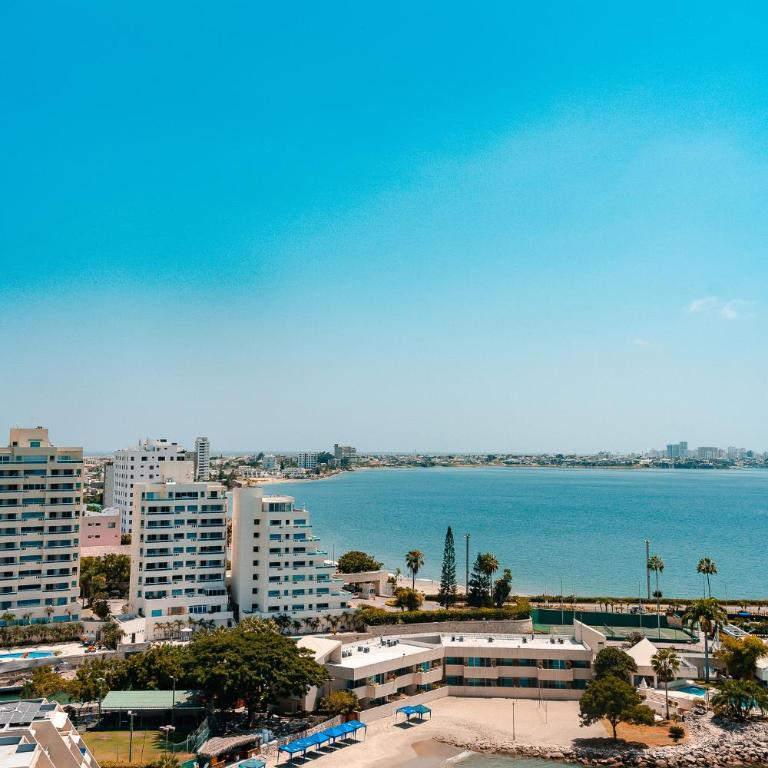 Departamento con vista al mar, piscina, jacuzzi y área BBQ - Apartment - 62