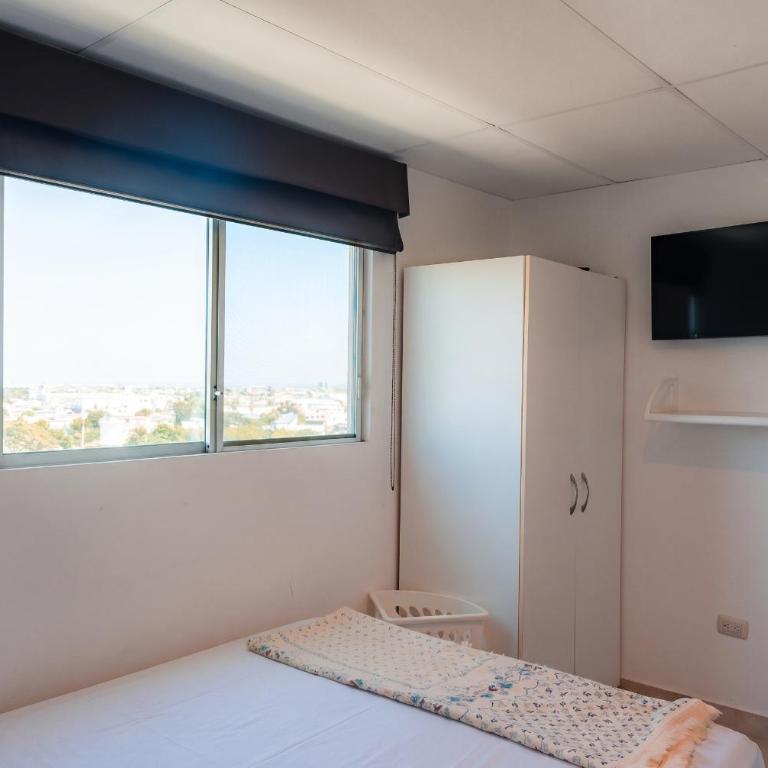 Departamento con vista al mar, piscina, jacuzzi y área BBQ - Apartment - 65