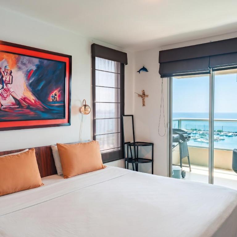 Departamento con vista al mar, piscina, jacuzzi y área BBQ - Apartment - 73