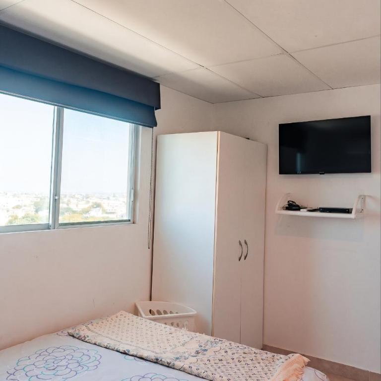 Departamento con vista al mar, piscina, jacuzzi y área BBQ - Apartment - 80