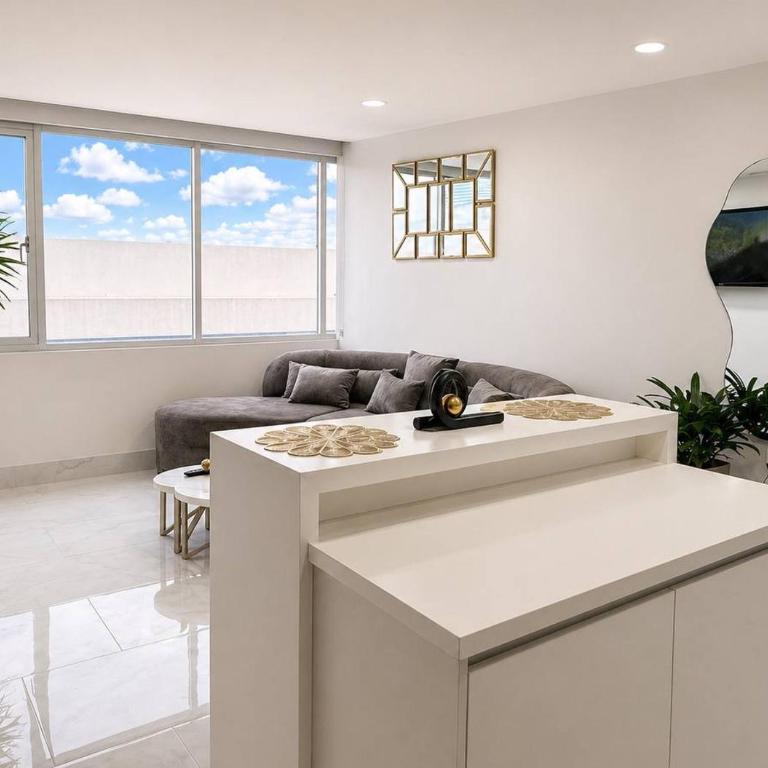 Elegante Apartamento en Torre Milenium La Aurora con Vista Urbana y Espacios Familiares Premium - Deluxe Suite - 14