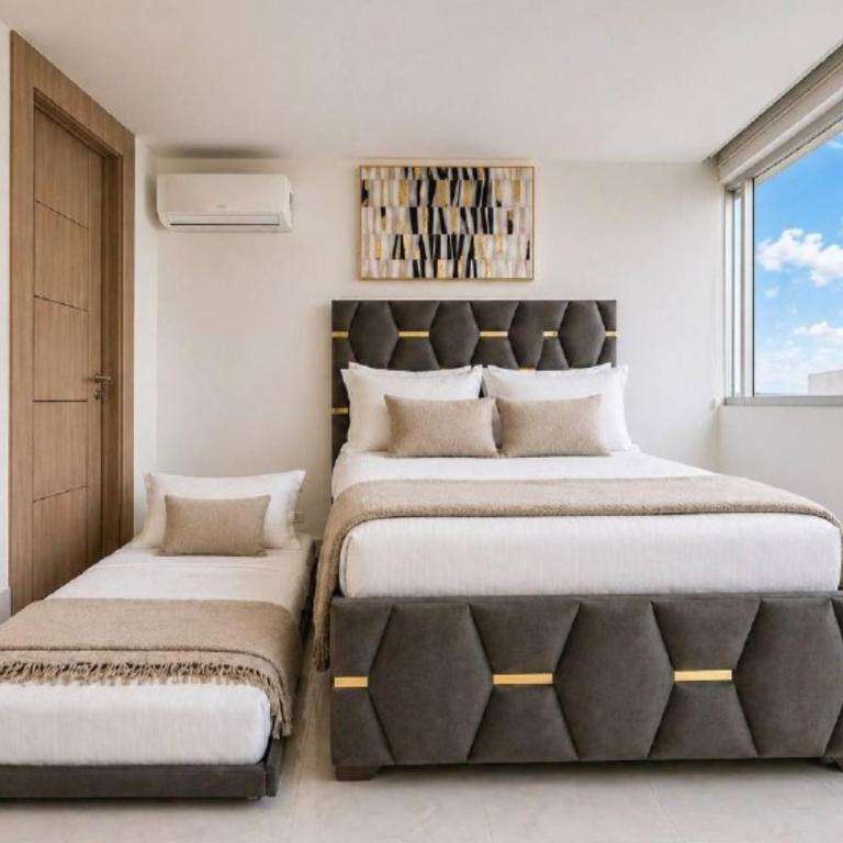 Elegante Apartamento en Torre Milenium La Aurora con Vista Urbana y Espacios Familiares Premium - Deluxe Suite - 32