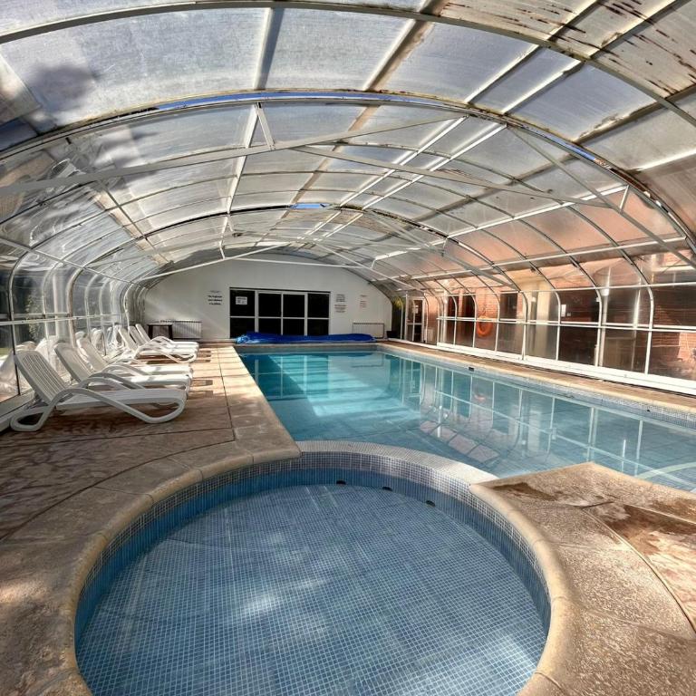Valeria Village Apart - Apartamento de 2 dormitorios con vistas al jardín - 1