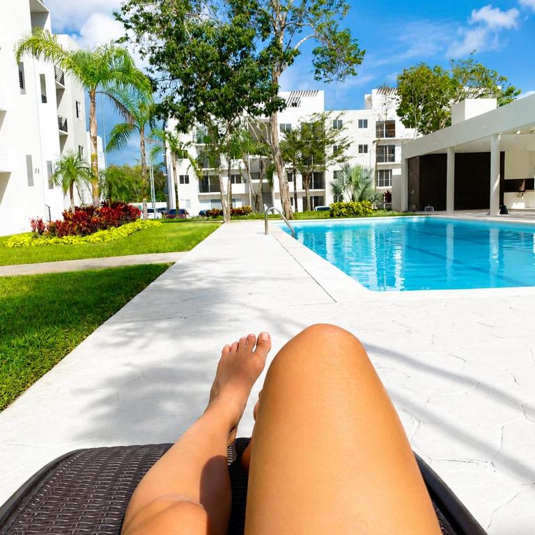 Kuxaan Cielo Terraza privada y comodidad a pocos minutos de la playa - Three-Bedroom Apartment - 73