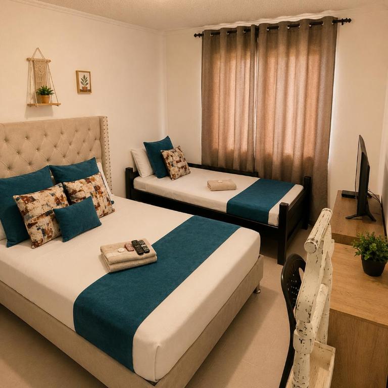 Hospedajes el Jardin - Habitación Doble Deluxe con cama supletoria - 4