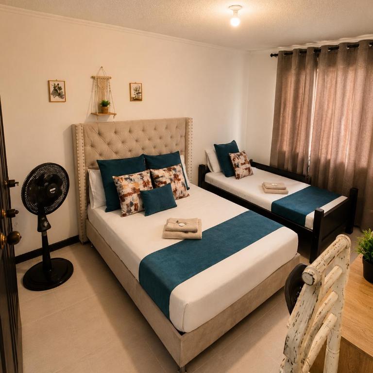 Hospedajes el Jardin - Habitación Doble Deluxe con cama supletoria - 5