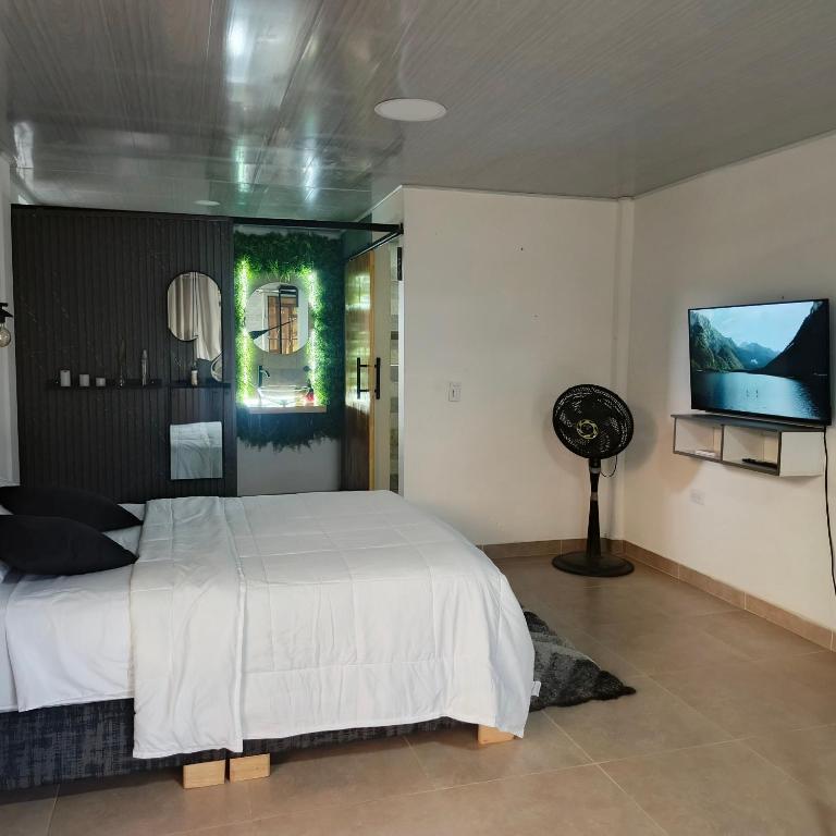 Suite campestre a 5 minutos del parque con aire acondicionado - Apartamento de 1 dormitorio - 34