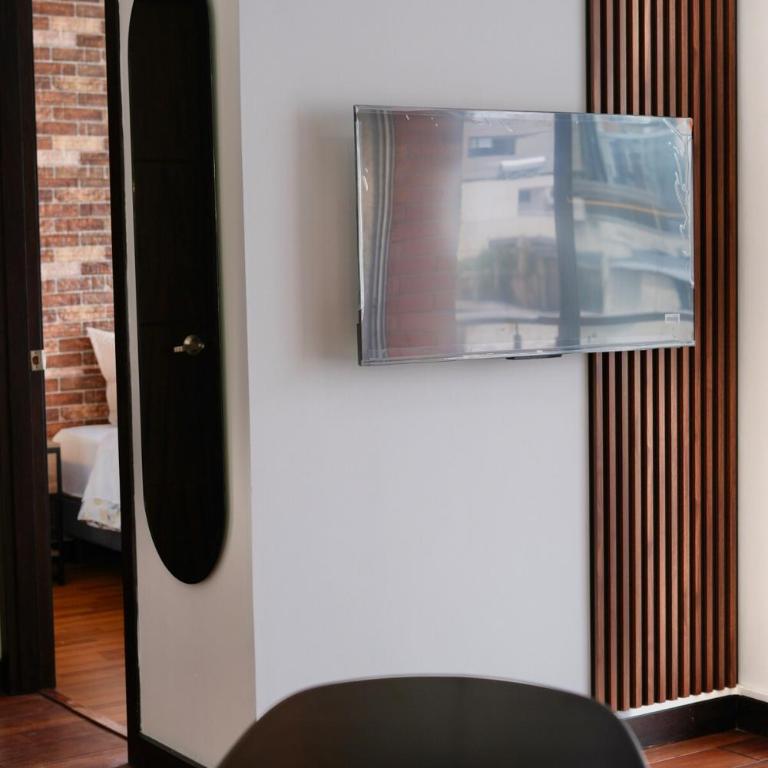 Suite with private balcony and parking - City view - One-Bedroom Apartment - 9
