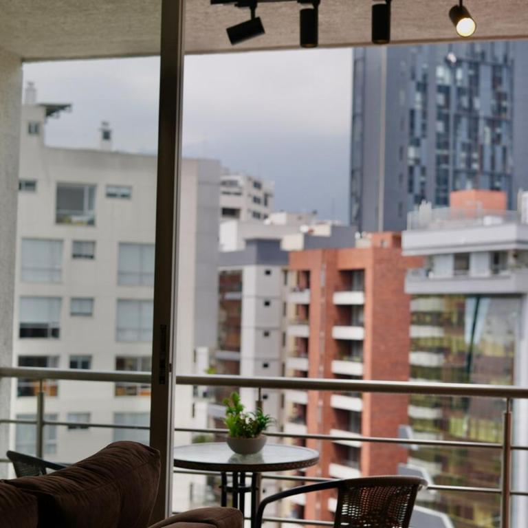 Suite with private balcony and parking - City view - One-Bedroom Apartment - 19