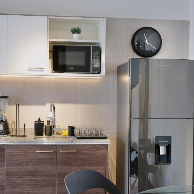 Suite with private balcony and parking - City view - One-Bedroom Apartment - 32