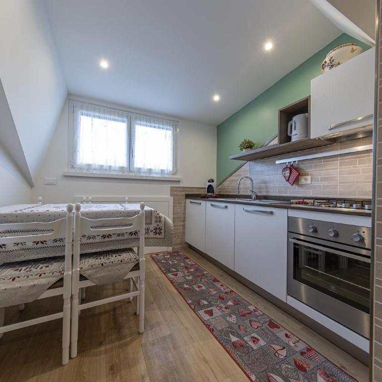 House Cuel Milena Folgaria - Green - Apartamento Deluxe de 2 dormitorios con vistas al jardín - 11