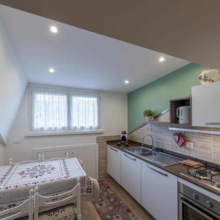 House Cuel Milena Folgaria - Green - Apartamento Deluxe de 2 dormitorios con vistas al jardín - 10