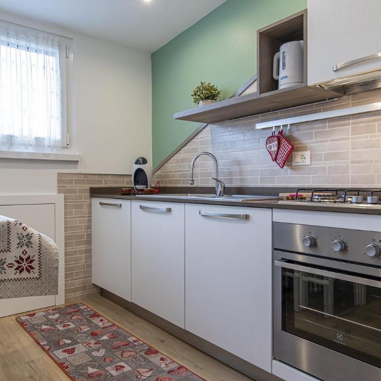 House Cuel Milena Folgaria - Green - Apartamento Deluxe de 2 dormitorios con vistas al jardín - 13