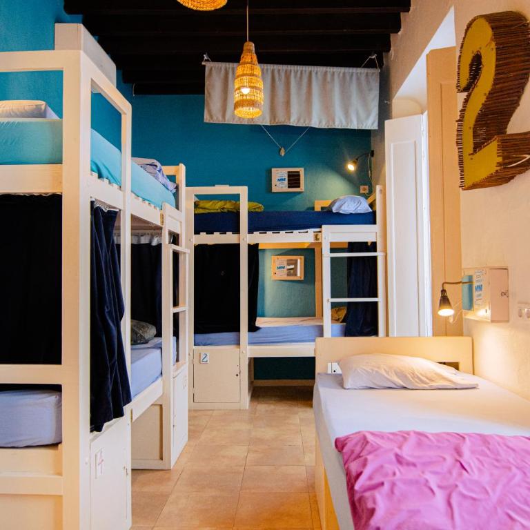 Casa Caracol - Cama en habitación compartida mixta con 7 camas y baño privado - 10