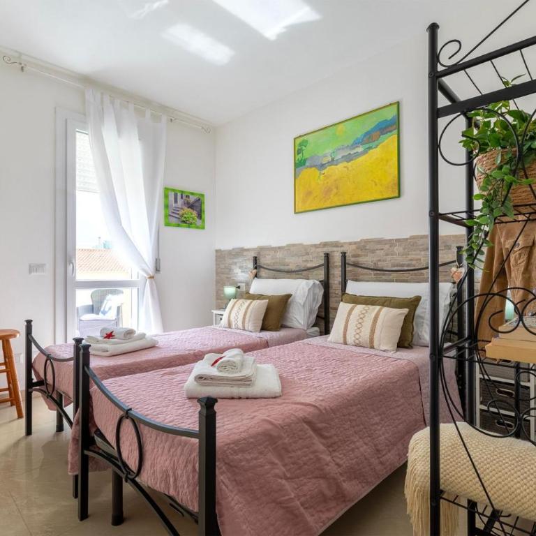 Il giardino fiorito - Casa con 2 Camere da Letto - 12