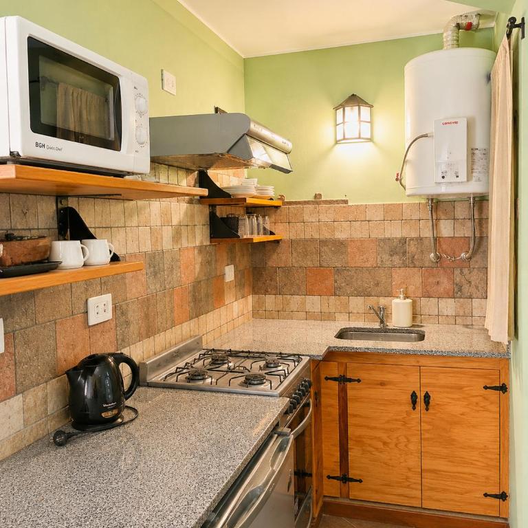 Cabañas La Matera Apart - Apartment with Garden View - 4