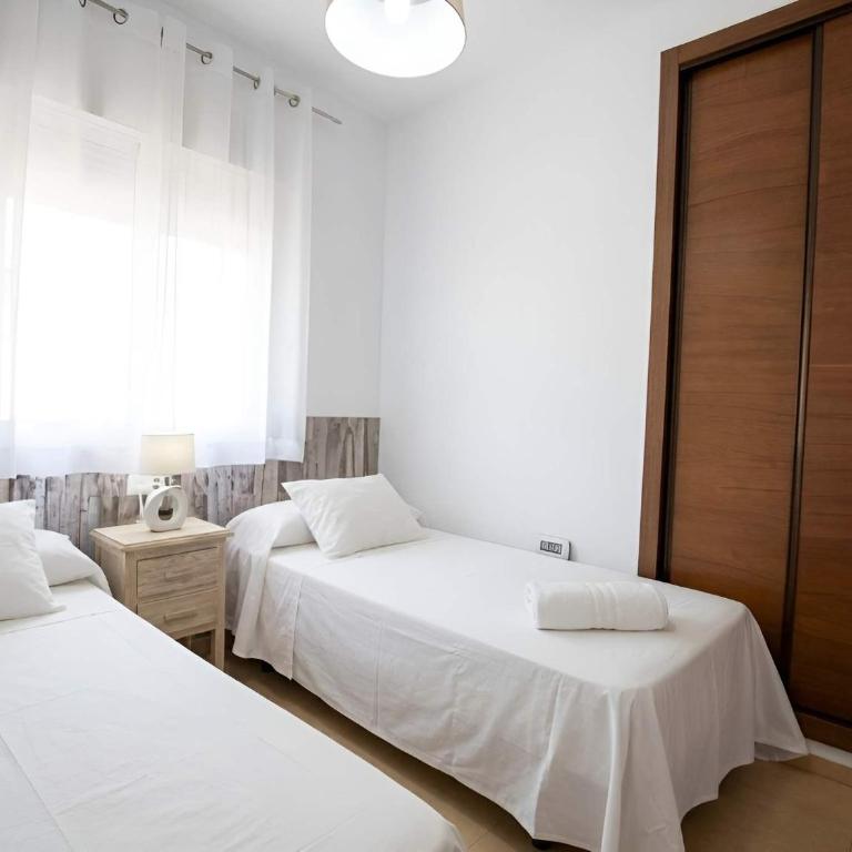 Apartamento con piscina compartida y parking gratis cerca de Tartessus - Apartamento - 21