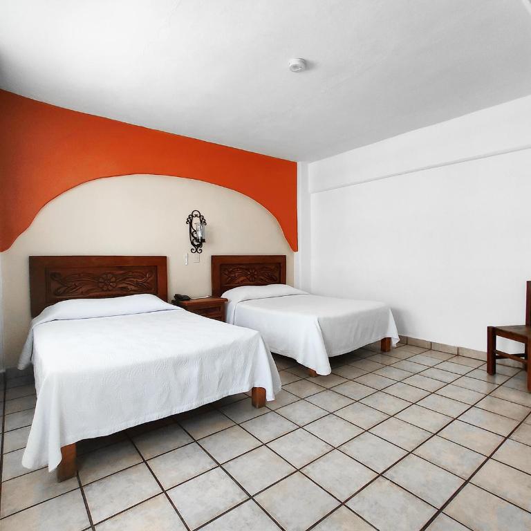 Hotel El Pescador - Habitación Doble Estándar con 2 camas dobles - 1