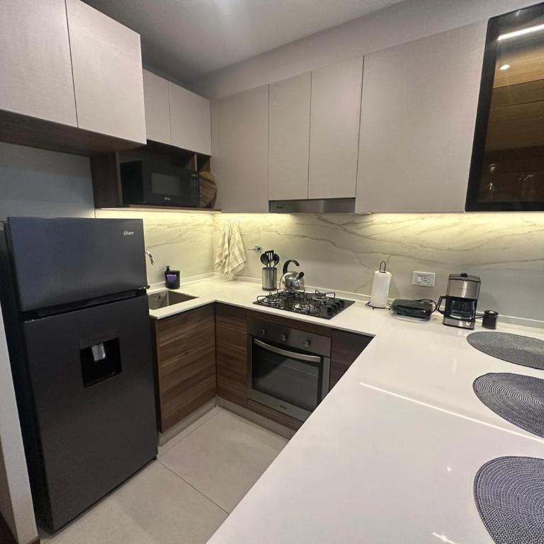 Departamento moderno en inmediaciones del parque Fidel Anze, en la zona norte de Cochabamba, cerca de restaurantes y transporte - Apartamento de 1 dormitorio - 2