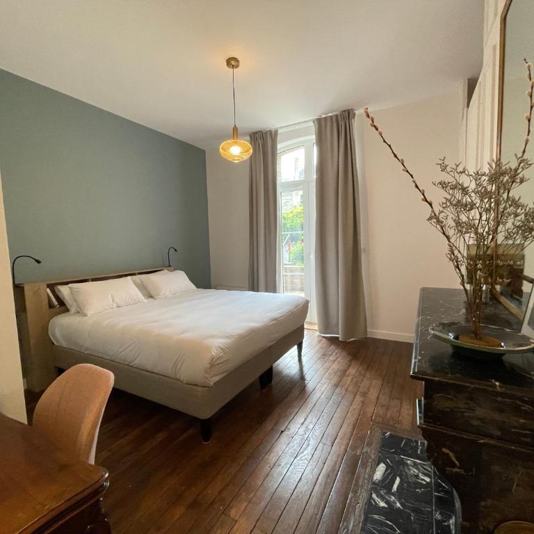 Appartements boutique dans un hôtel particulier rénové Centre & gare Parking privé Villa Vermillon Galerie - Apartamento con vistas al jardín - 20