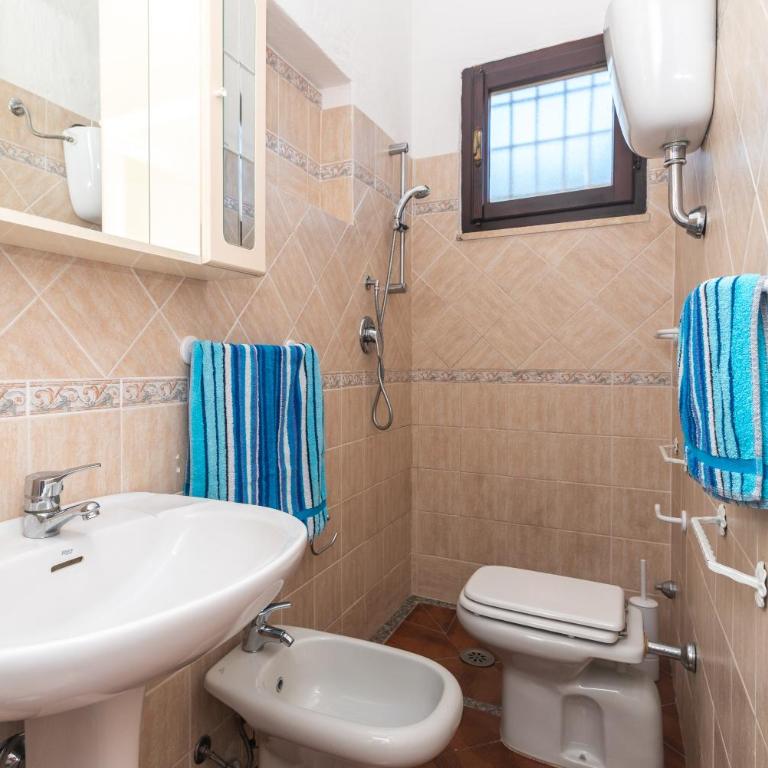 Trilocale rosa Tamerici - Two-Bedroom Deluxe Apartment with Garden View - 12
