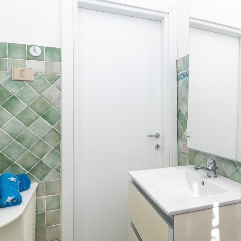 Bilocale Bianco Tamerici - One-Bedroom Apartment with Garden View - 12